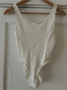 Cream Ribbed One-Piece Bodysuit